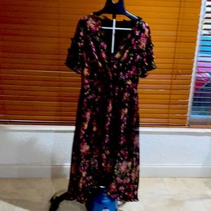 Beautiful Kensi flowery and ruffle dress that flows!
